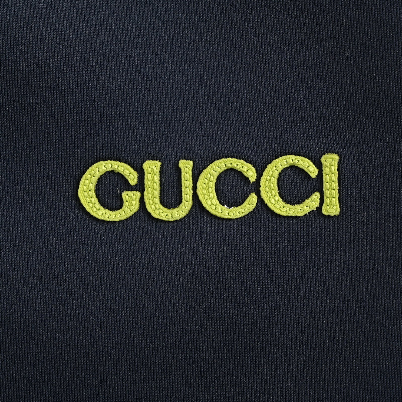 Gucci Navy Knit Jogger Pants with Neon Embroidered Script