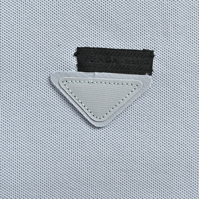 PRADA Triangle Badge Piqué Polo Shirt PRD Powder Blue