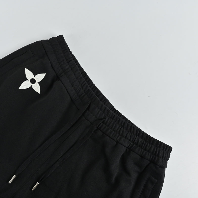 Louis Vuitton Scattered Monogram Graphic Joggers — Black