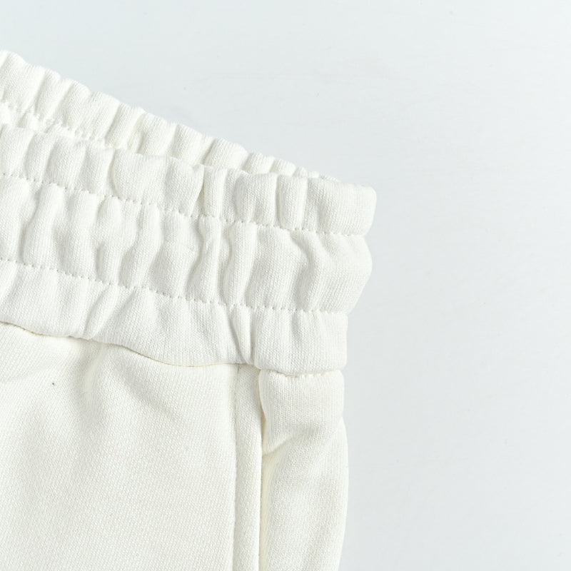 Louis Vuitton Signature Script Embroidered Shorts — Cream